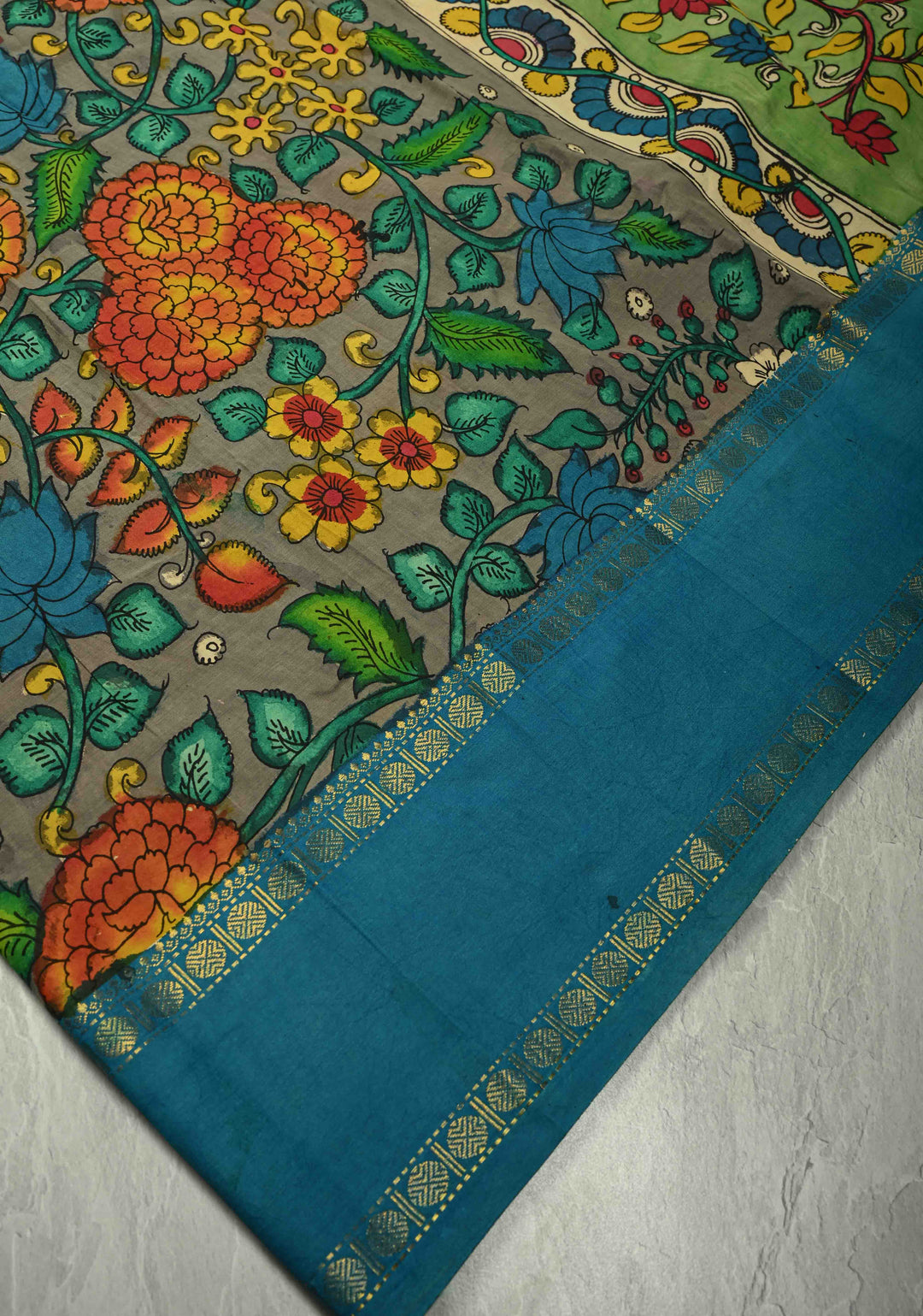 Floral and Peacock Theme : Grey Authentic Pen kalamkari on pure Chennuri Silk Saree with Border