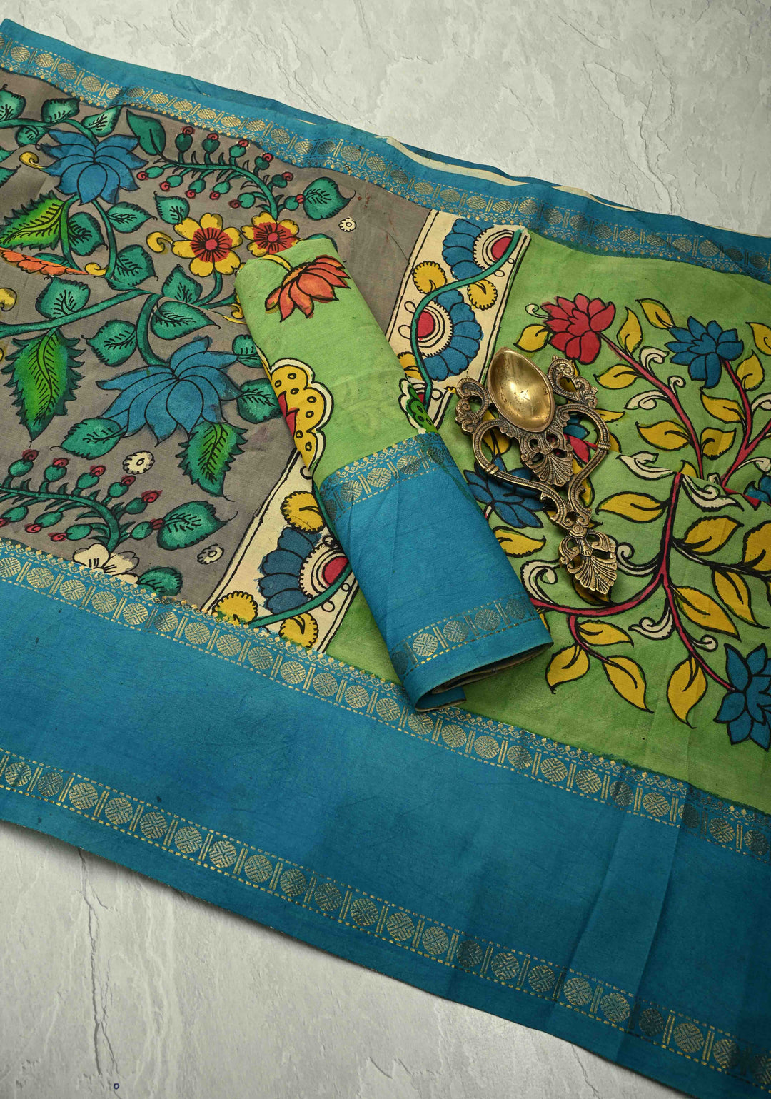 Floral and Peacock Theme : Grey Authentic Pen kalamkari on pure Chennuri Silk Saree with Border