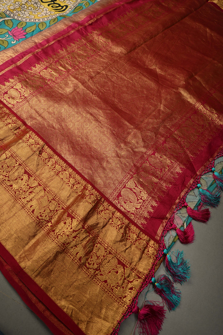 Nari Shakti and Floral Theme  : Turquoise Blue Authentic Pen Kalamkari on Pure Kanjivaram Silk Saree with Deep Maroon Zari Border | SILK MARK CERTIFIED | SHOBITAM