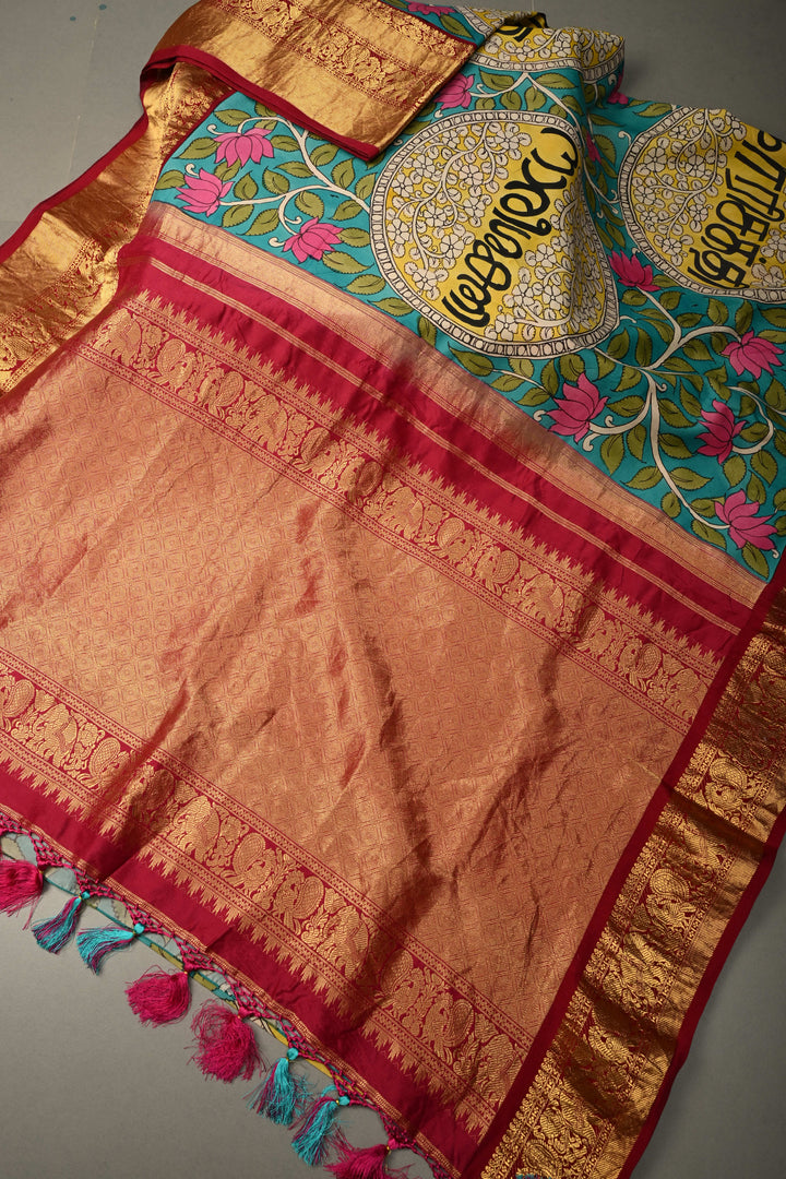 Nari Shakti and Floral Theme  : Turquoise Blue Authentic Pen Kalamkari on Pure Kanjivaram Silk Saree with Deep Maroon Zari Border | SILK MARK CERTIFIED | SHOBITAM