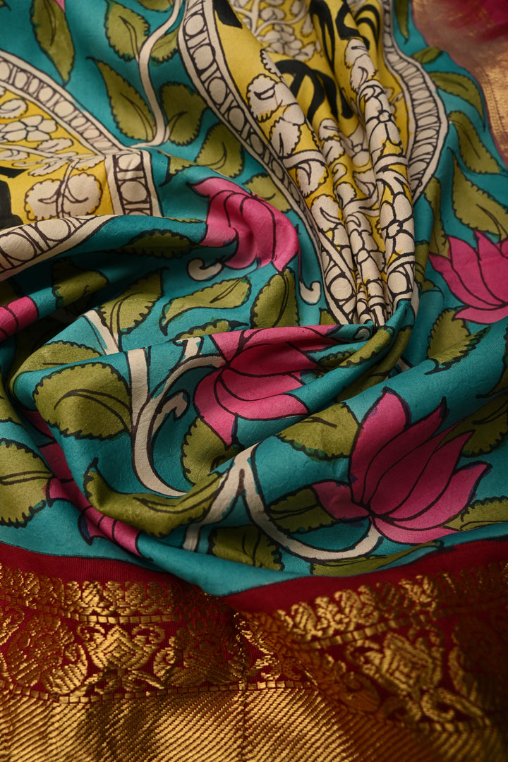 Nari Shakti and Floral Theme  : Turquoise Blue Authentic Pen Kalamkari on Pure Kanjivaram Silk Saree with Deep Maroon Zari Border | SILK MARK CERTIFIED | SHOBITAM