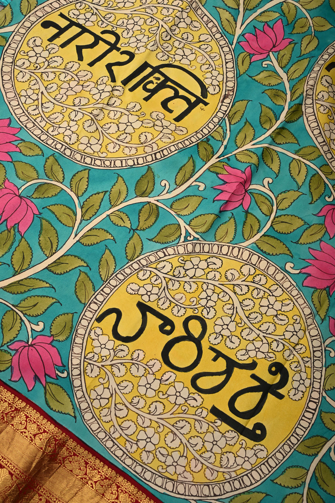 Nari Shakti and Floral Theme  : Turquoise Blue Authentic Pen Kalamkari on Pure Kanjivaram Silk Saree with Deep Maroon Zari Border | SILK MARK CERTIFIED | SHOBITAM