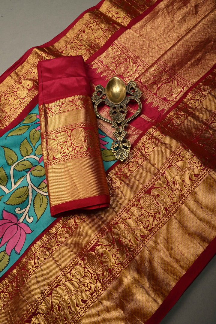 Nari Shakti and Floral Theme  : Turquoise Blue Authentic Pen Kalamkari on Pure Kanjivaram Silk Saree with Deep Maroon Zari Border | SILK MARK CERTIFIED | SHOBITAM