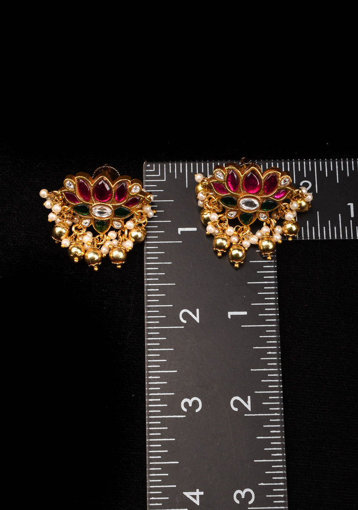 Jadau Blooming Lotus Earrings with Kundan stones and dangling beads | Shobitam Jewelry