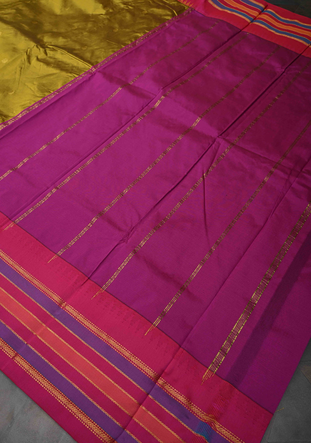 Semi Silk Saree in Moss Green with Zari Buttas And Temple borders