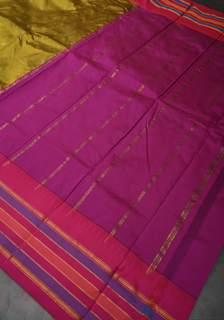Semi Silk Saree in Moss Green with Zari Buttas And Temple borders