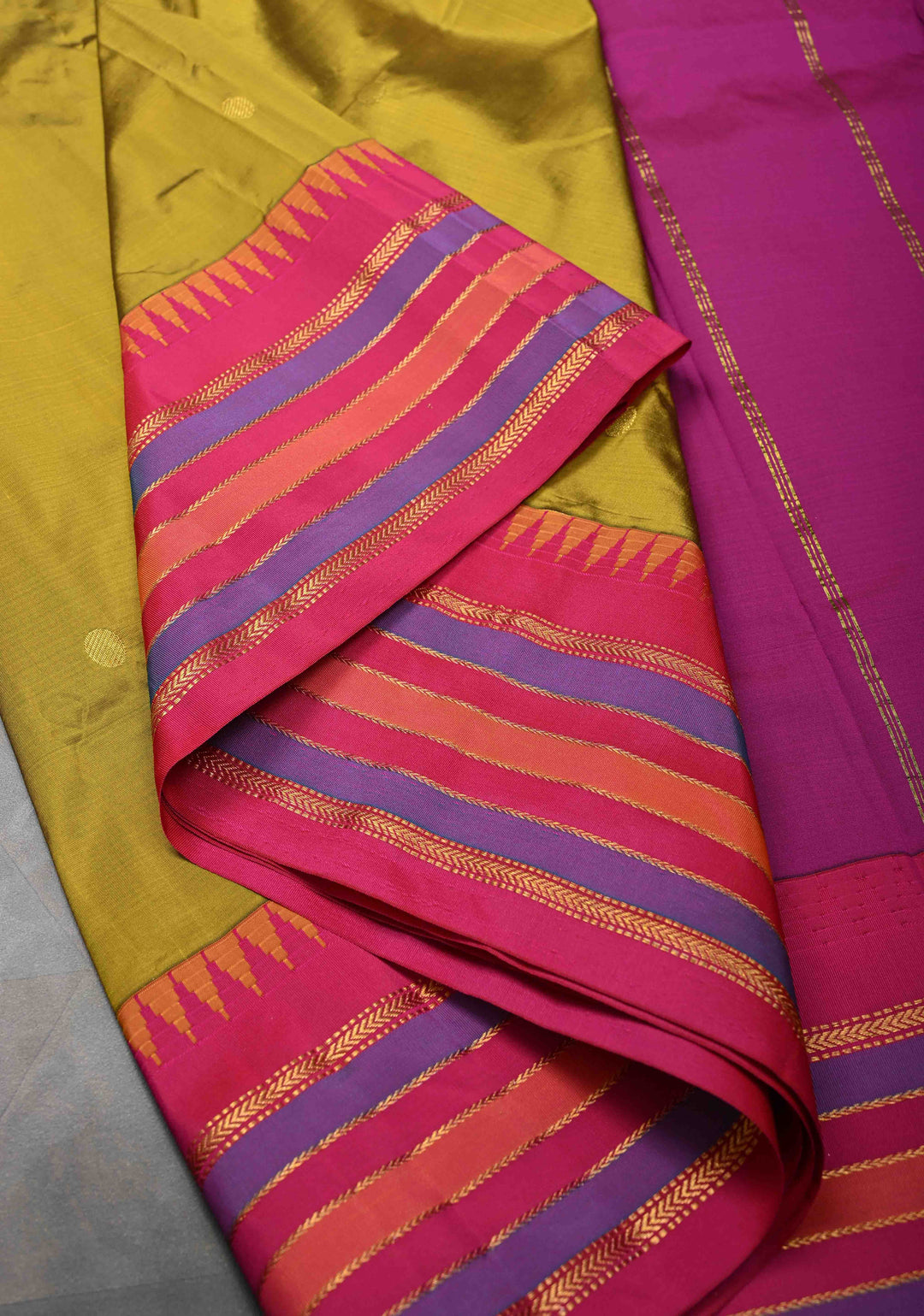 Semi Silk Saree in Moss Green with Zari Buttas And Temple borders