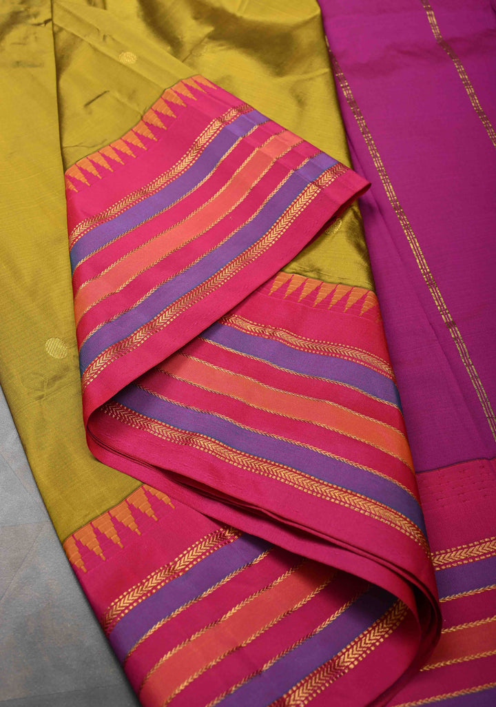 Semi Silk Saree in Moss Green with Zari Buttas And Temple borders