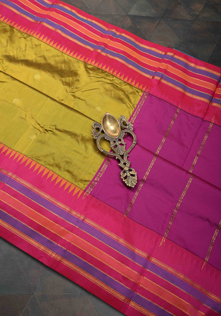 Semi Silk Saree in Moss Green with Zari Buttas And Temple borders