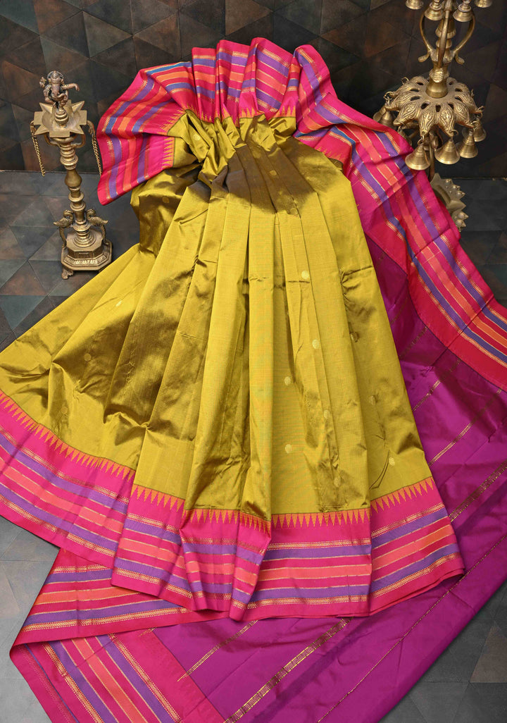 Semi Silk Saree in Moss Green with Zari Buttas And Temple borders