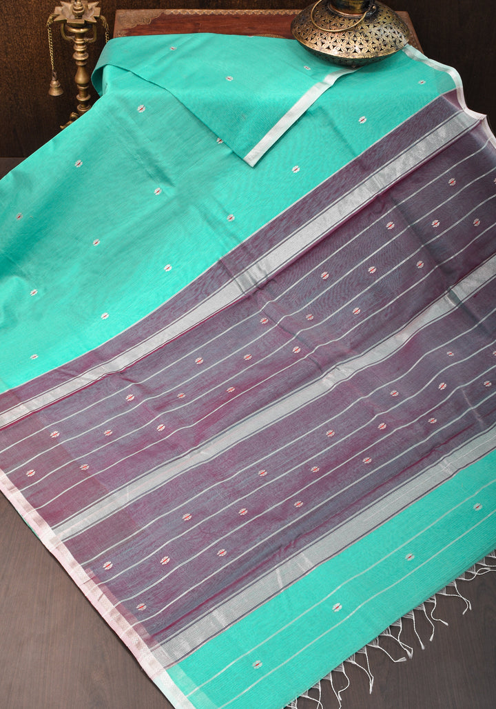 Handwoven Maheshwari Silk Cotton Saree  in Teal with minimal zari borders| Sarees By Shobitam