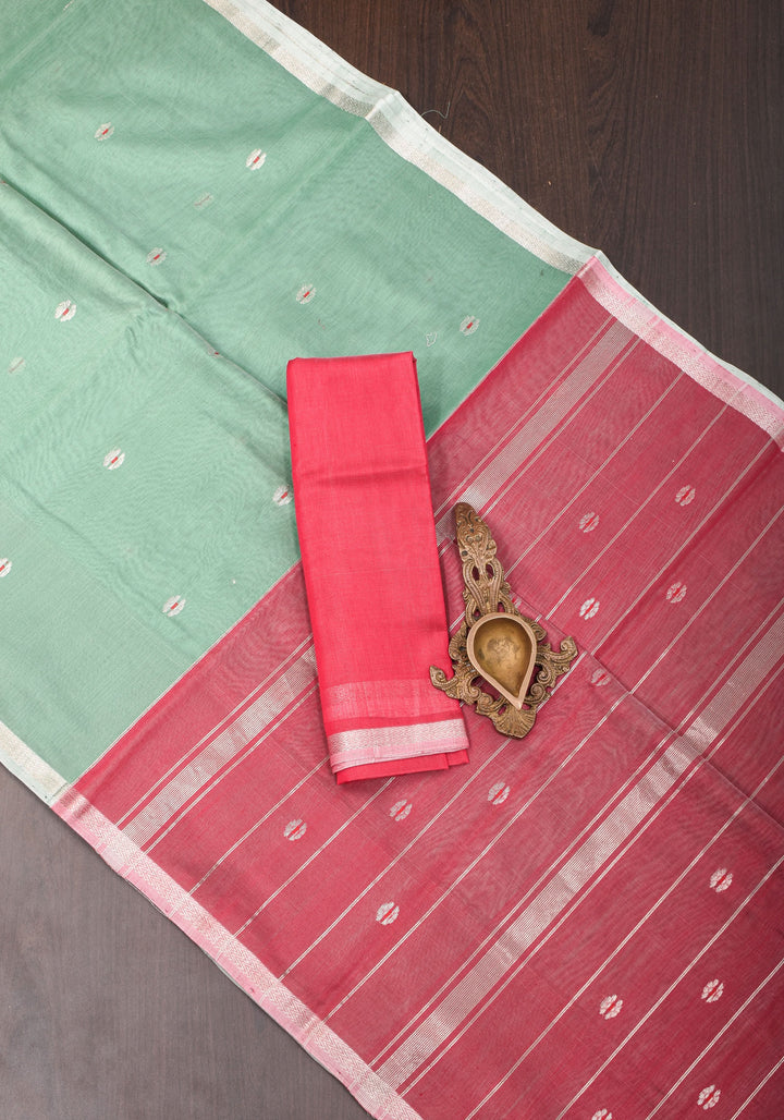 Handwoven Maheshwari Silk Cotton Saree in Green with Pink Pallu and Floral buttas