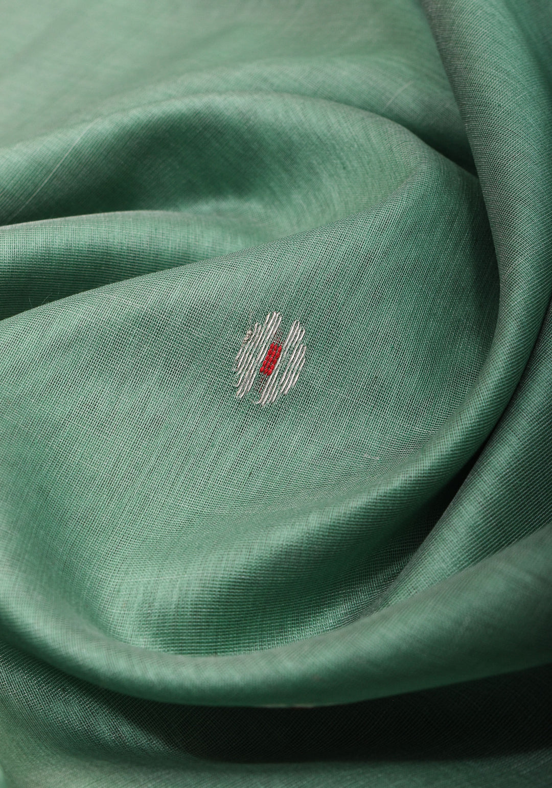 Handwoven Maheshwari Silk Cotton Saree in Green with Pink Pallu and Floral buttas