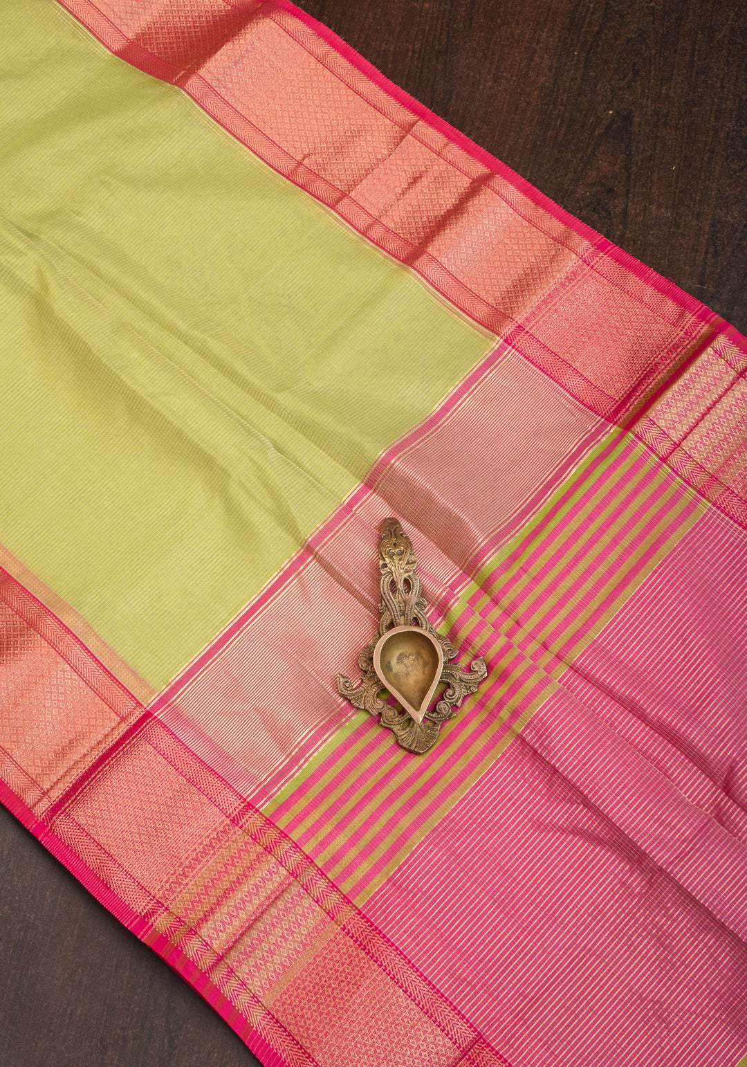 Handwoven Maheshwari silk cotton saree in Pista Green with Zari Checks