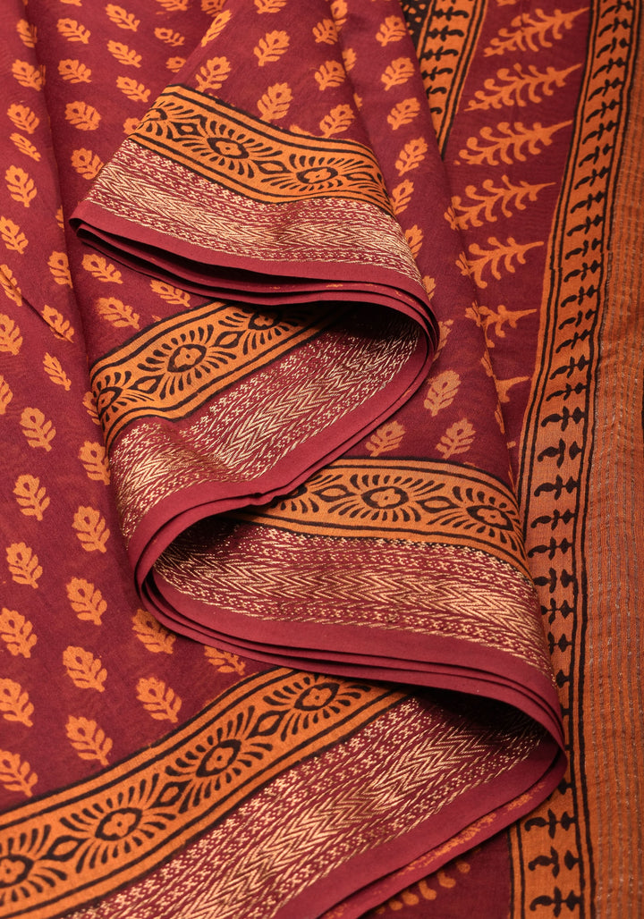 Bagh Print on Handwoven Maheshwari Silk Cotton Saree in red with minimal zari borders