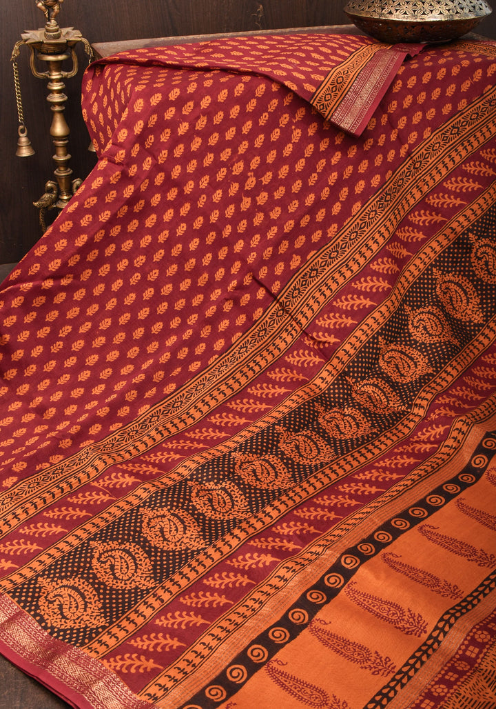 Bagh Print on Handwoven Maheshwari Silk Cotton Saree in red with minimal zari borders