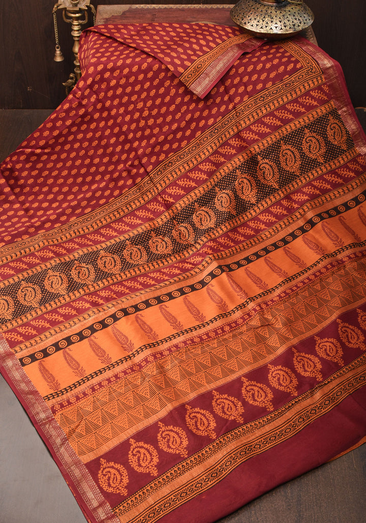 Bagh Print on Handwoven Maheshwari Silk Cotton Saree in red with minimal zari borders
