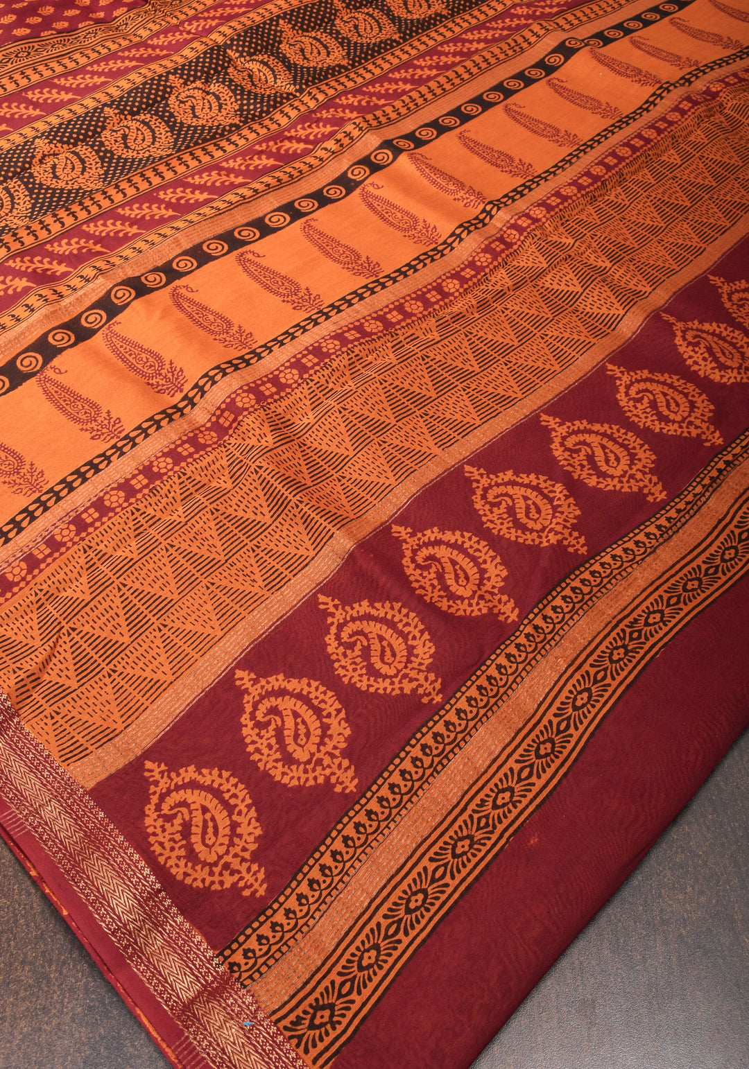 Bagh Print on Handwoven Maheshwari Silk Cotton Saree in red with minimal zari borders