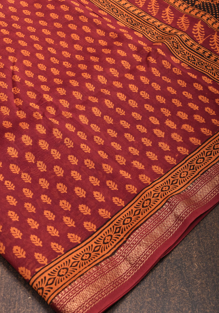 Bagh Print on Handwoven Maheshwari Silk Cotton Saree in red with minimal zari borders