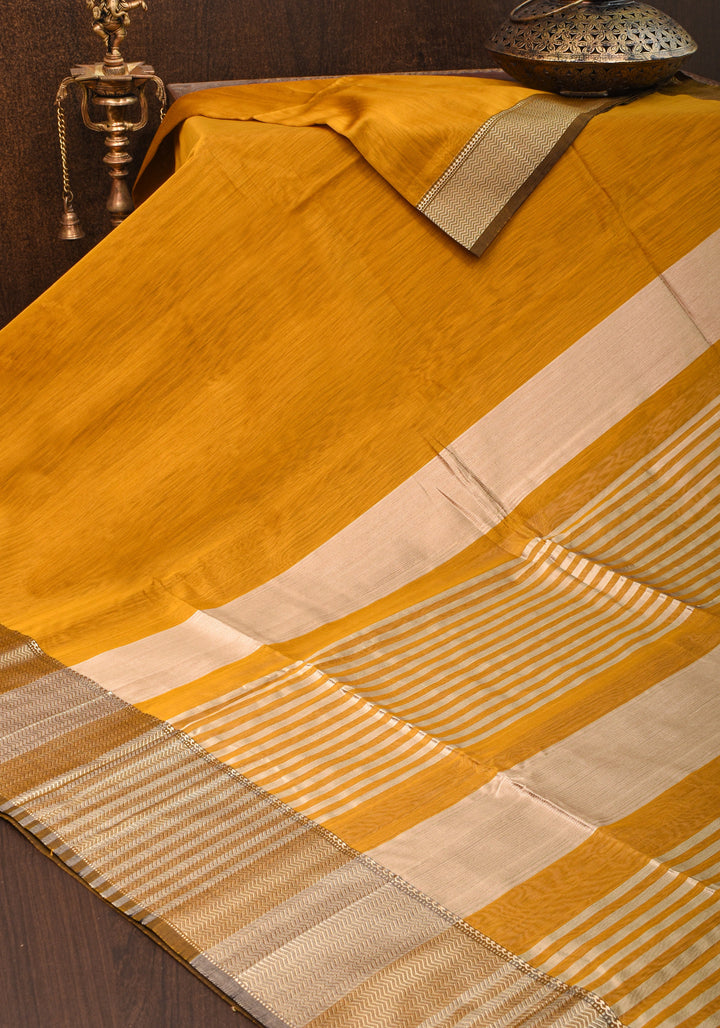 Yellowish Orange Handwoven Maheshwari Silk Cotton Saree with Zari borders