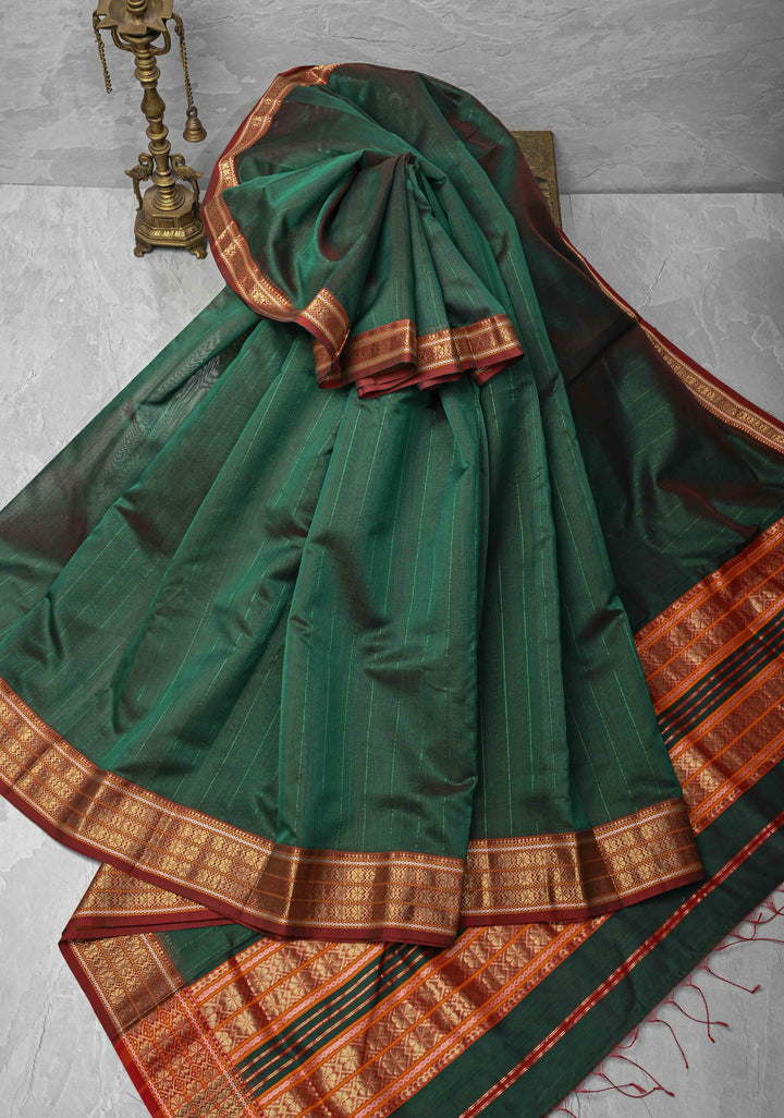 Green Dual tone Handwoven Maheshwari Silk Cotton Saree with Muted Stripes and Zari Borders
