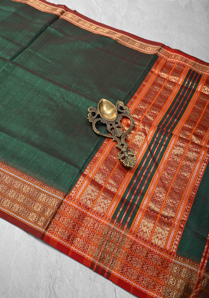 Green Dual tone Handwoven Maheshwari Silk Cotton Saree with Muted Stripes and Zari Borders