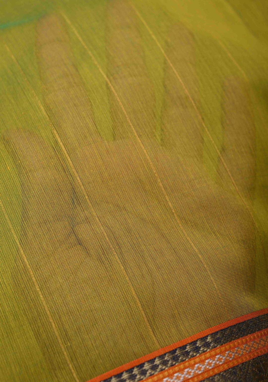 Lime Green Handwoven Maheshwari Silk Cotton Saree with Muted Stripes and Zari Borders