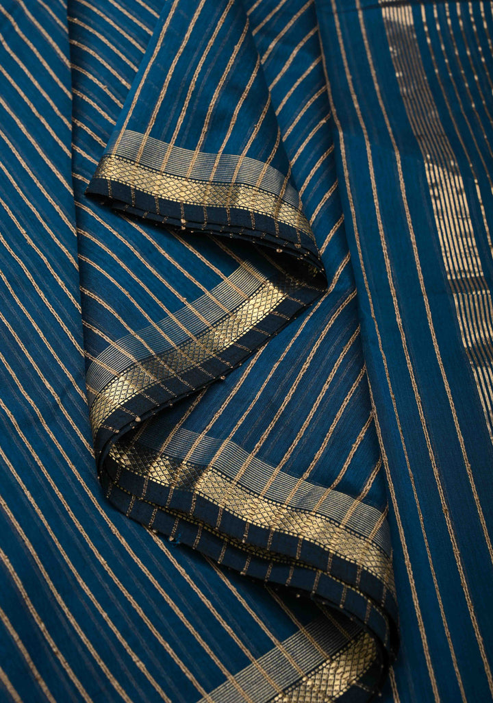 Prussian Blue Handwoven Maheshwari Silk Cotton Saree with Vertical Stripes and Minimal Zari Borders