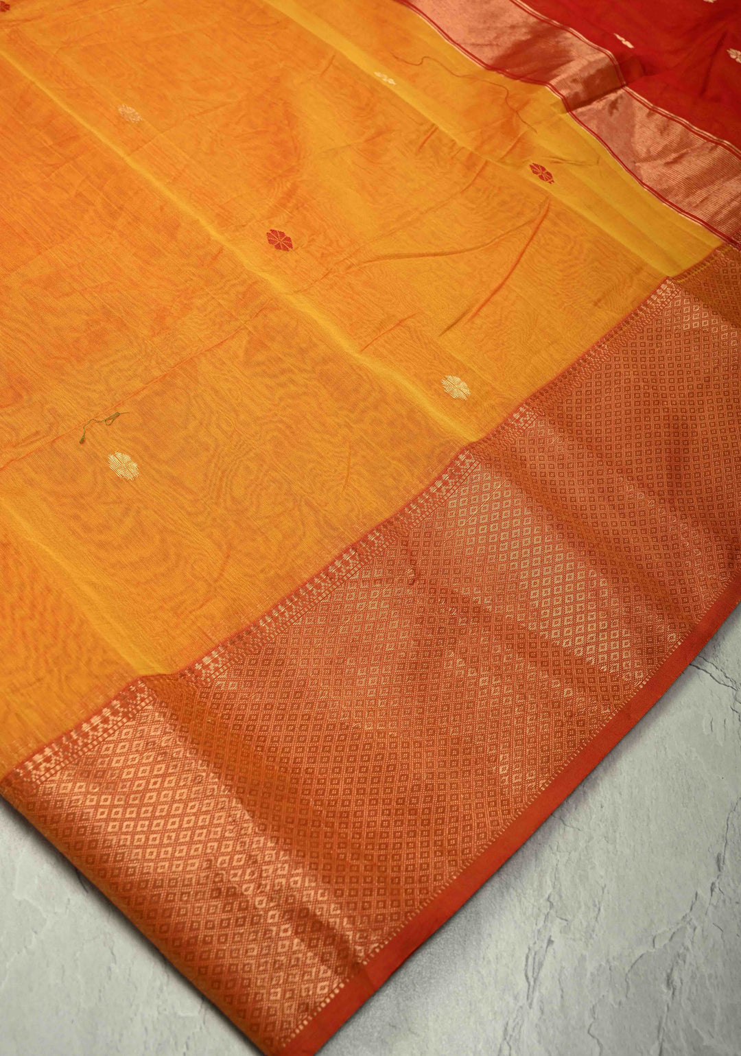 Yellowish Orange Dual Tone Handwoven Maheshwari Silk Cotton Saree with Resham Buttas and Contrast Border