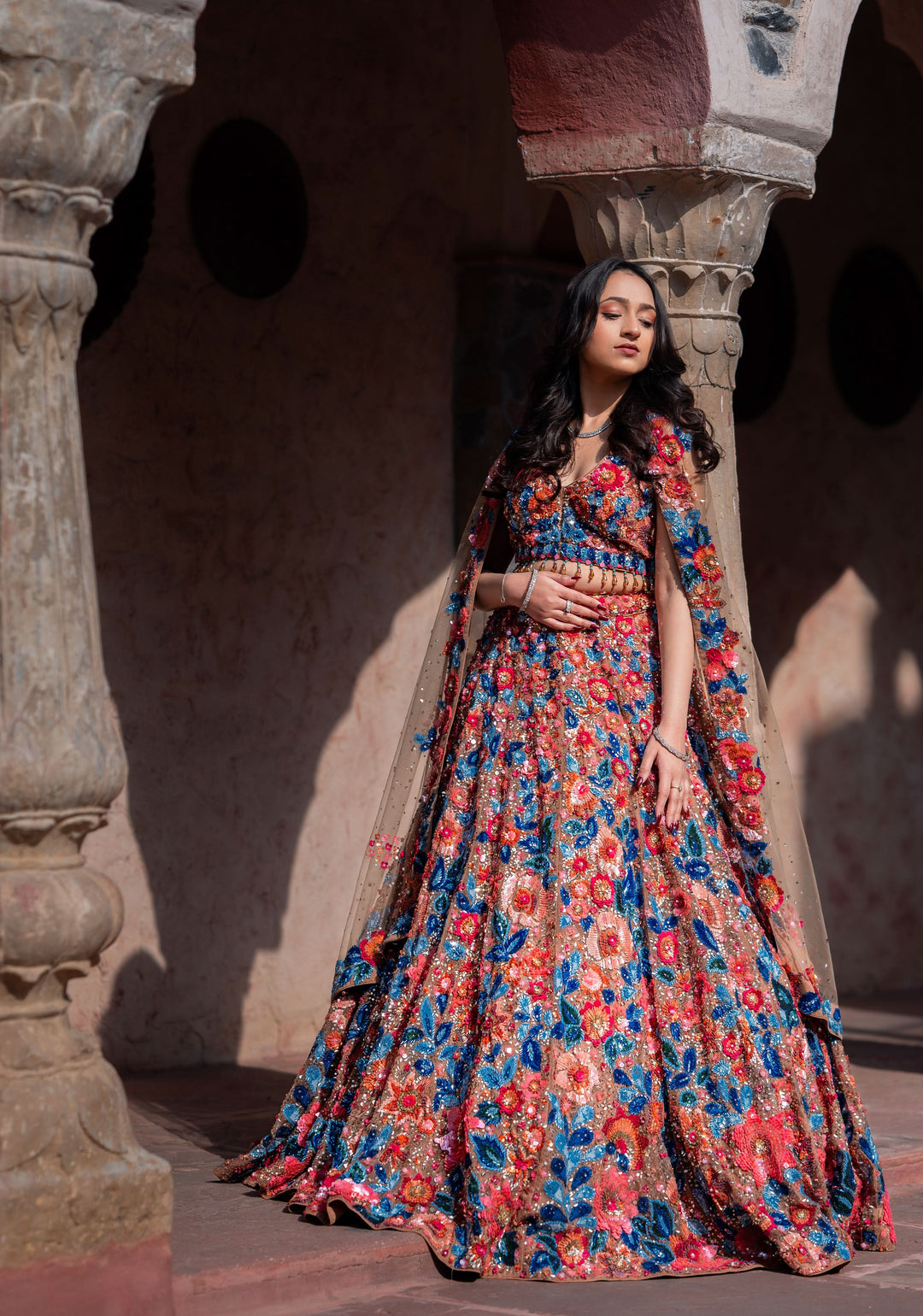 Dazzling Wildflower Lehenga with hand-embroidery in Net in Rust and Blue, Customizable, Made to Order