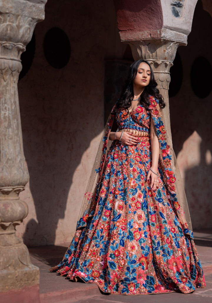 Dazzling Wildflower Lehenga with hand-embroidery in Net in Rust and Blue, Customizable, Made to Order