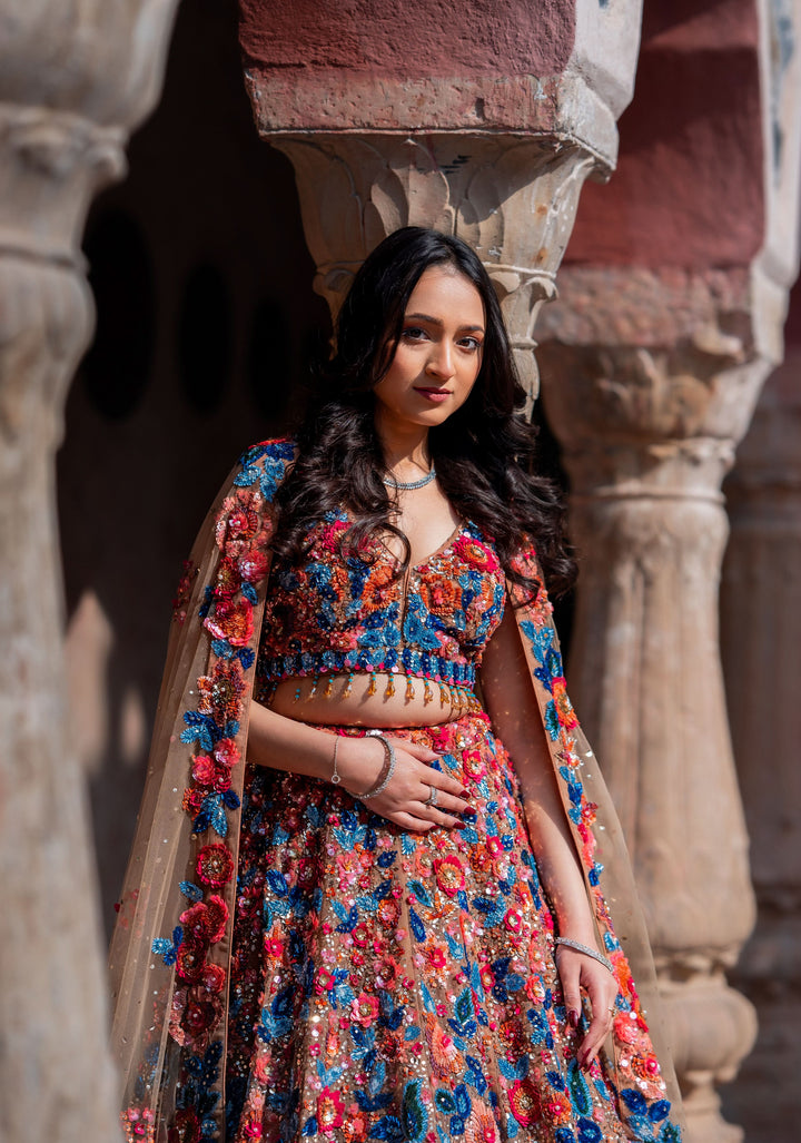 Dazzling Wildflower Lehenga with hand-embroidery in Net in Rust and Blue, Customizable, Made to Order
