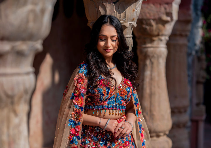 Dazzling Wildflower Lehenga with hand-embroidery in Net in Rust and Blue, Customizable, Made to Order