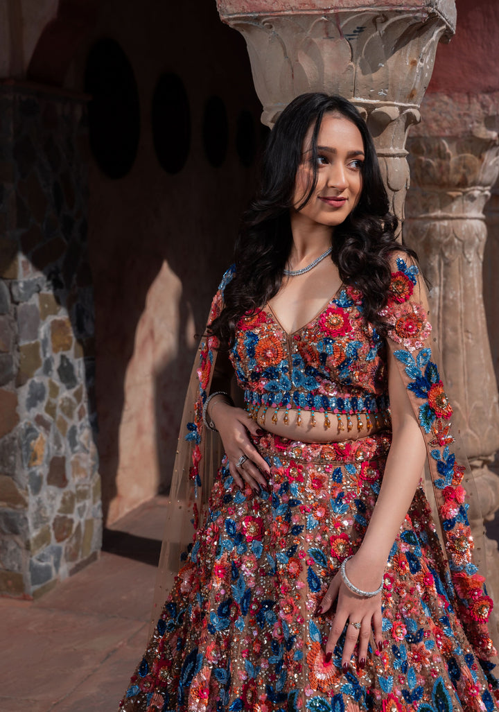 Dazzling Wildflower Lehenga with hand-embroidery in Net in Rust and Blue, Customizable, Made to Order