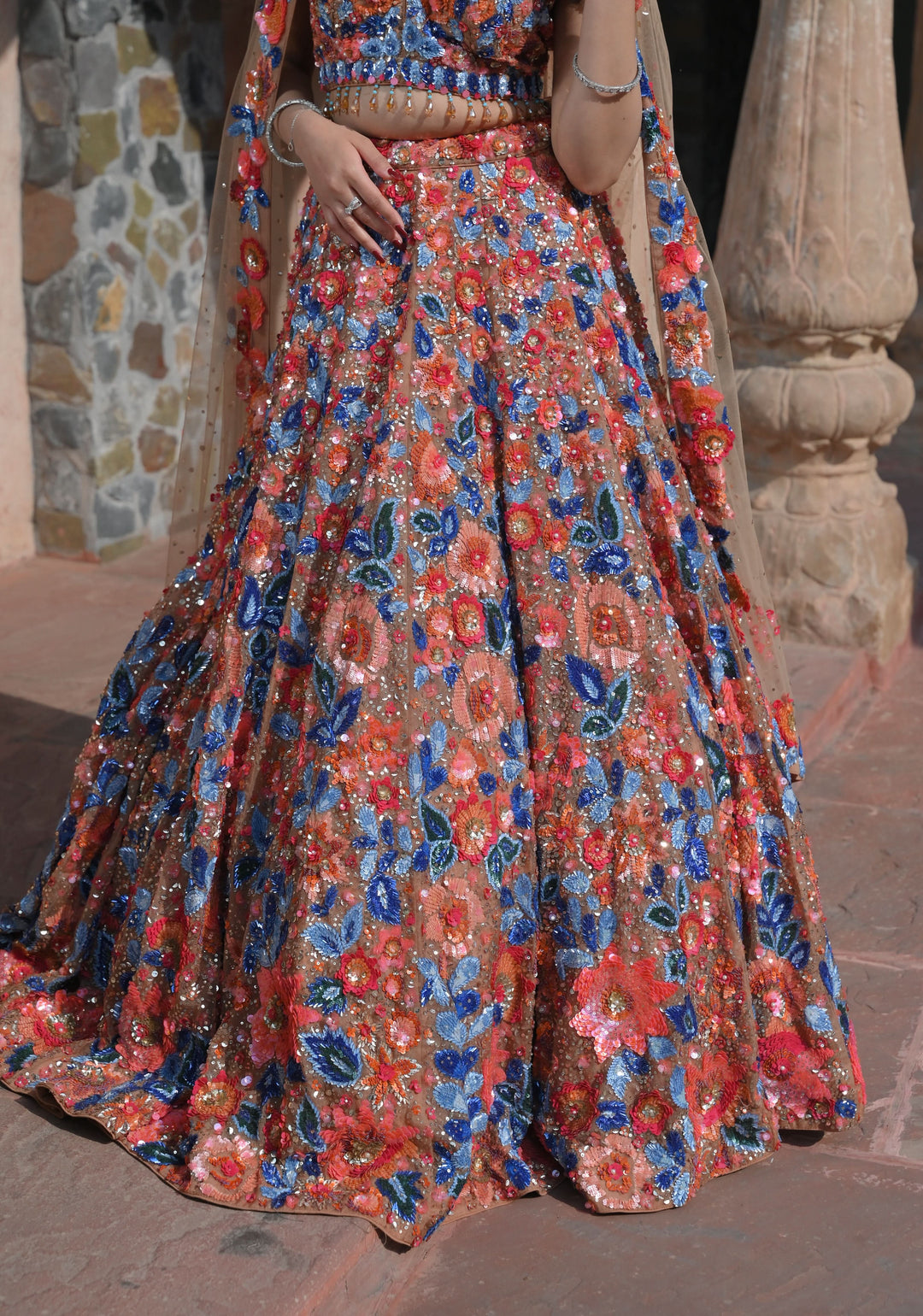 Dazzling Wildflower Lehenga with hand-embroidery in Net in Rust and Blue, Customizable, Made to Order