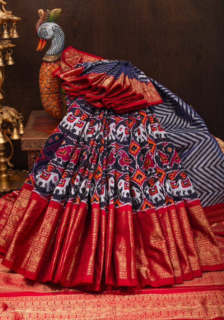 Unique Midnight Blue Ikkat Patola Kanjivaram Fusion Silk Saree with Panel design and zari border | SILK MARK CERTIFIED