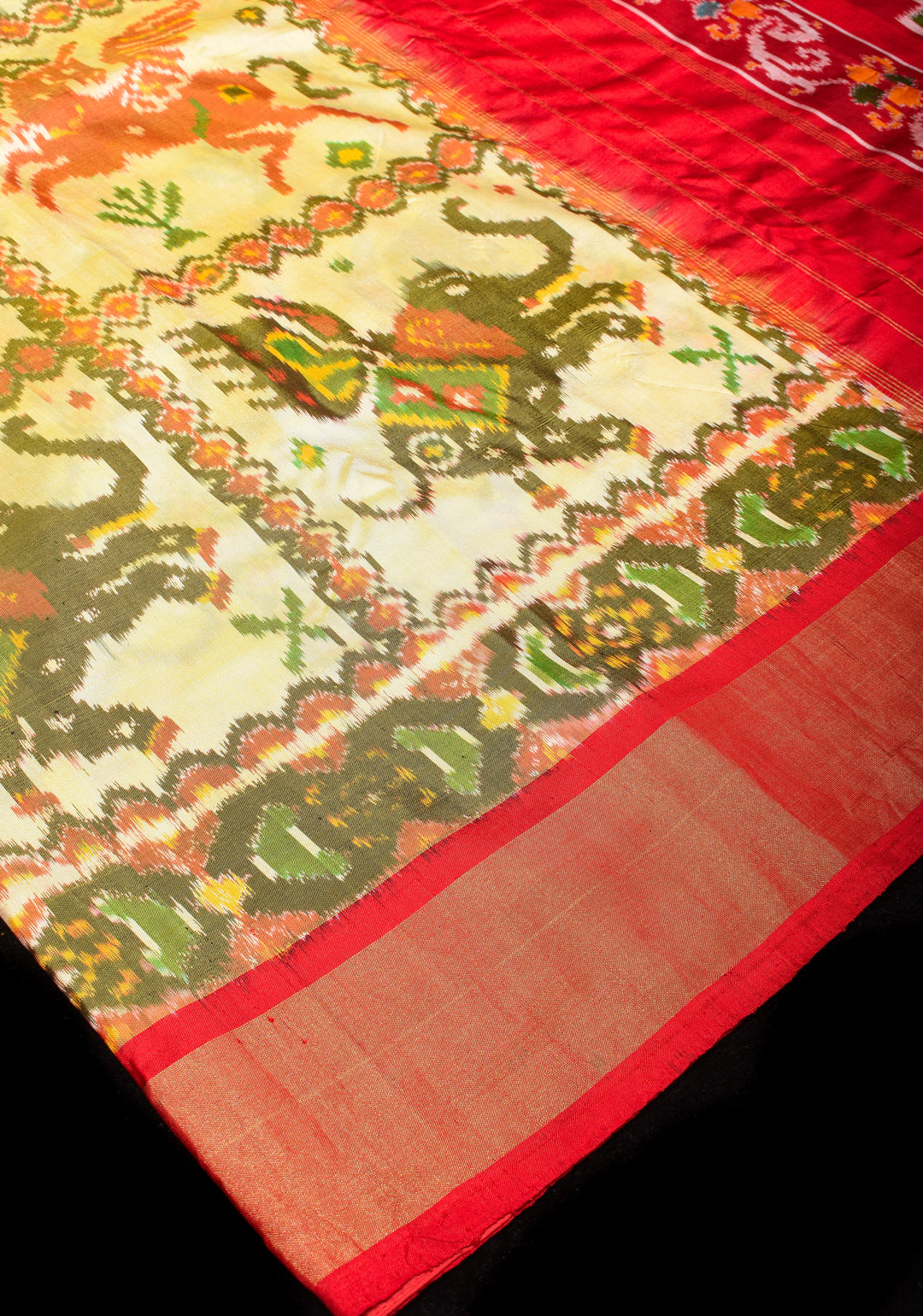 Ivory Lime Ikkat Pure Silk Saree with Jungle Inspired Motifs and Contrast Red border I SILK MARK CERTIFIED