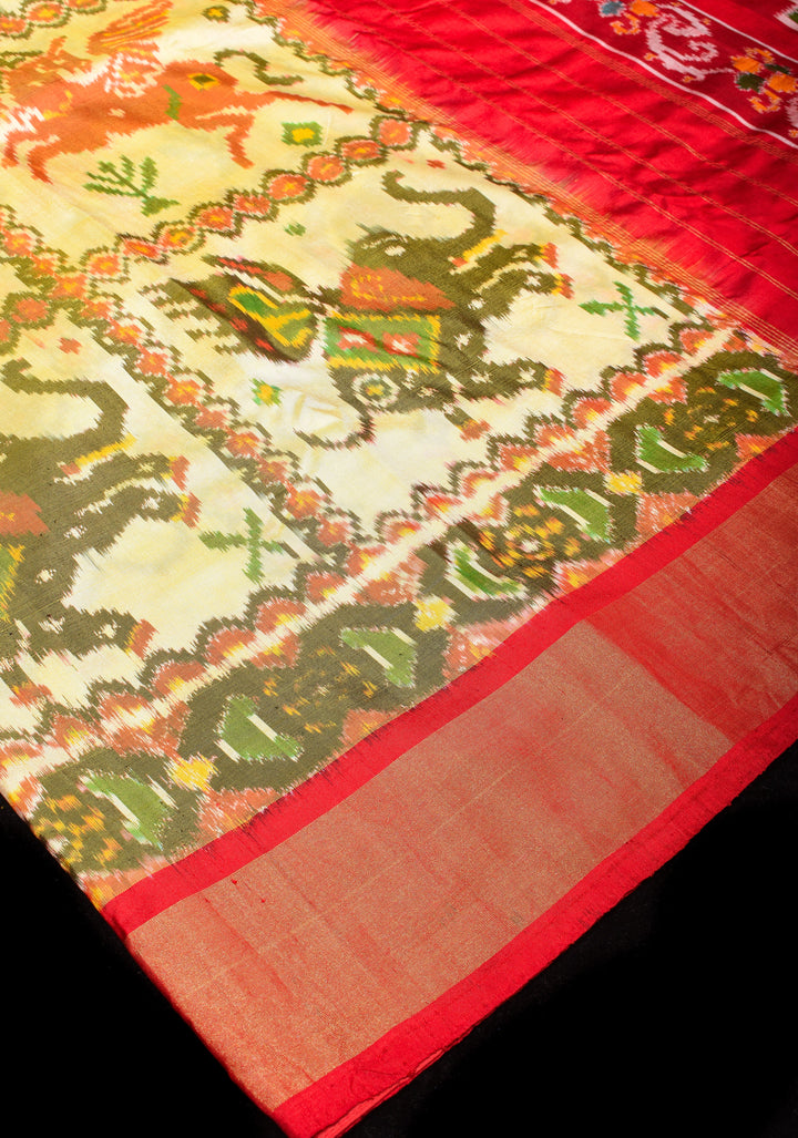 Ivory Lime Ikkat Pure Silk Saree with Jungle Inspired Motifs and Contrast Red border I SILK MARK CERTIFIED