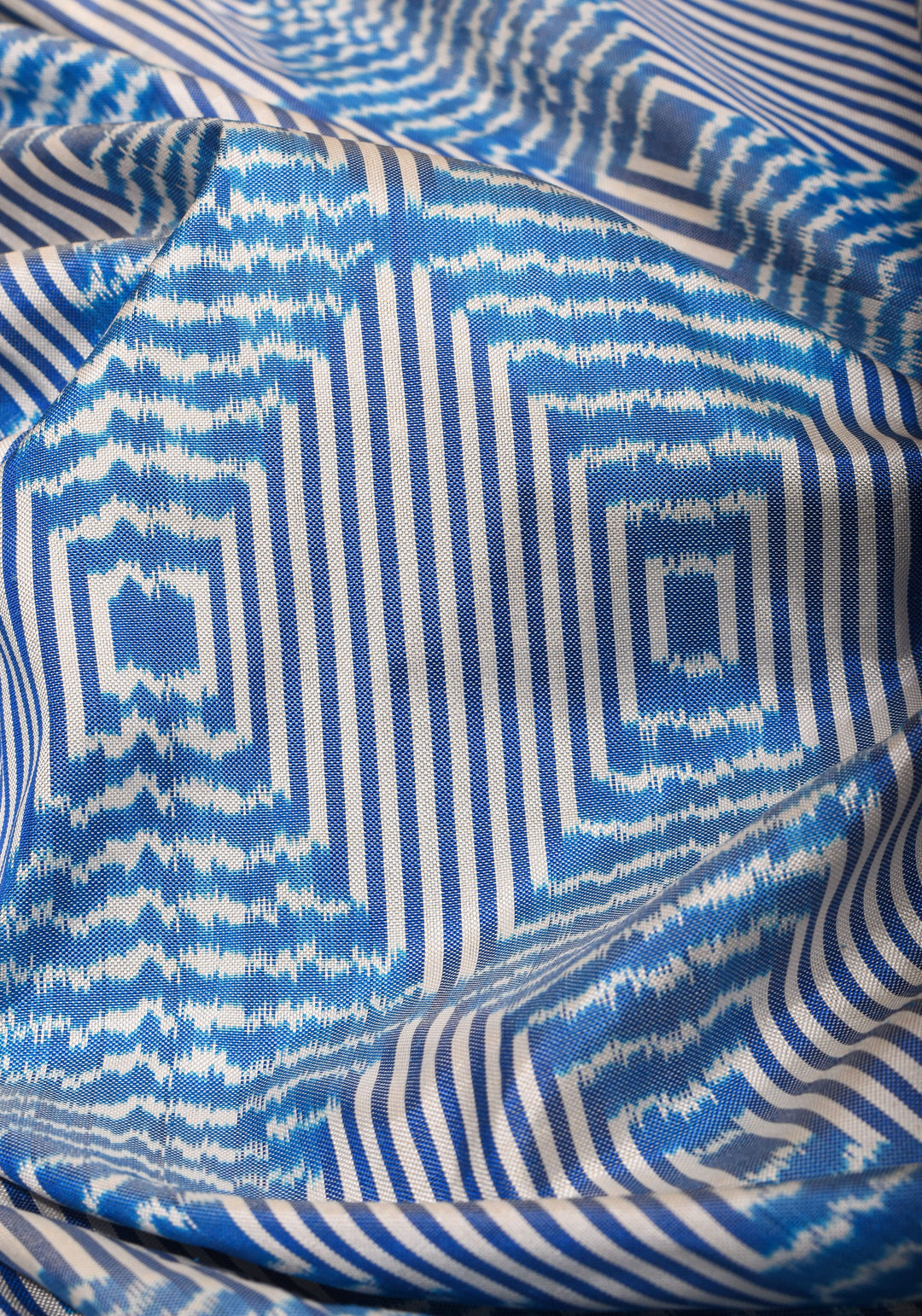 Blue and White Base Ikkat Optical Illusion Design Patola with Kanjivaram Pure Silk Fusion Saree  | SILK MARK CERTIFIED