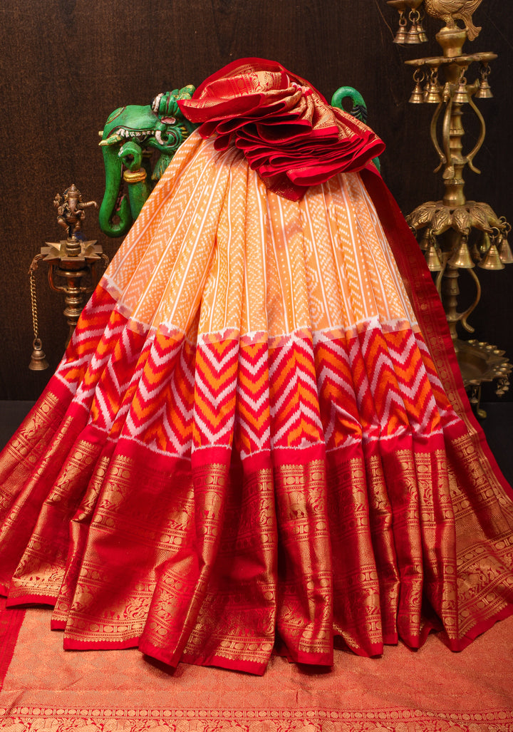 Peach Orange Ikkat Kanjivaram Fusion Pure Silk Saree with Ikkat pattern body and Zari Border| SILK MARK CERTIFIED