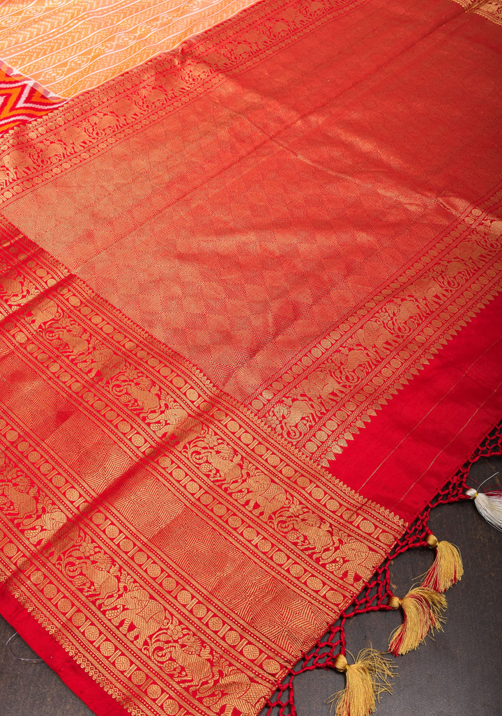 Peach Orange Ikkat Kanjivaram Fusion Pure Silk Saree with Ikkat pattern body and Zari Border| SILK MARK CERTIFIED