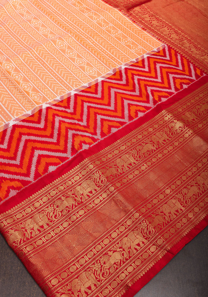 Peach Orange Ikkat Kanjivaram Fusion Pure Silk Saree with Ikkat pattern body and Zari Border| SILK MARK CERTIFIED