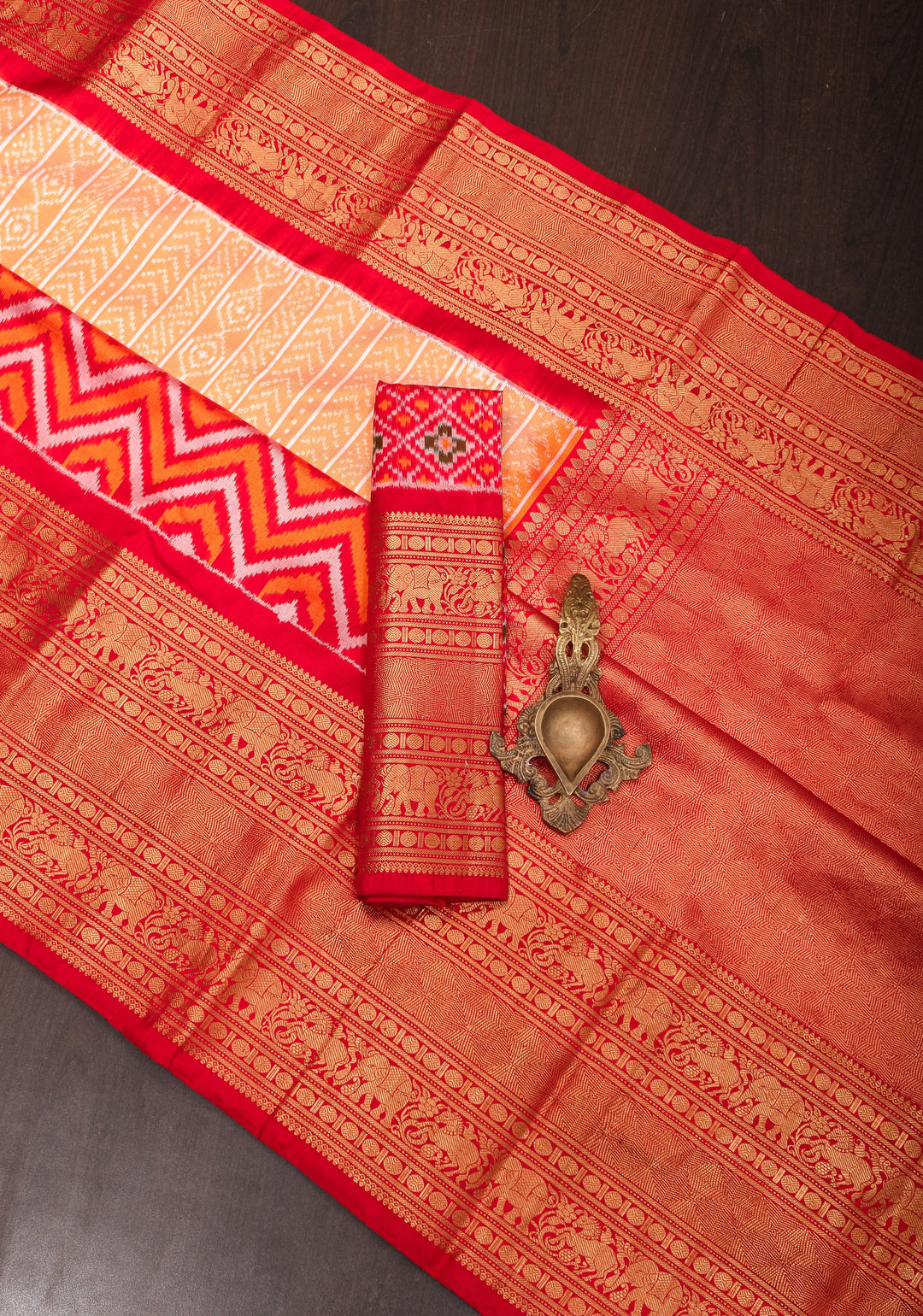 Peach Orange Ikkat Kanjivaram Fusion Pure Silk Saree with Ikkat pattern body and Zari Border| SILK MARK CERTIFIED