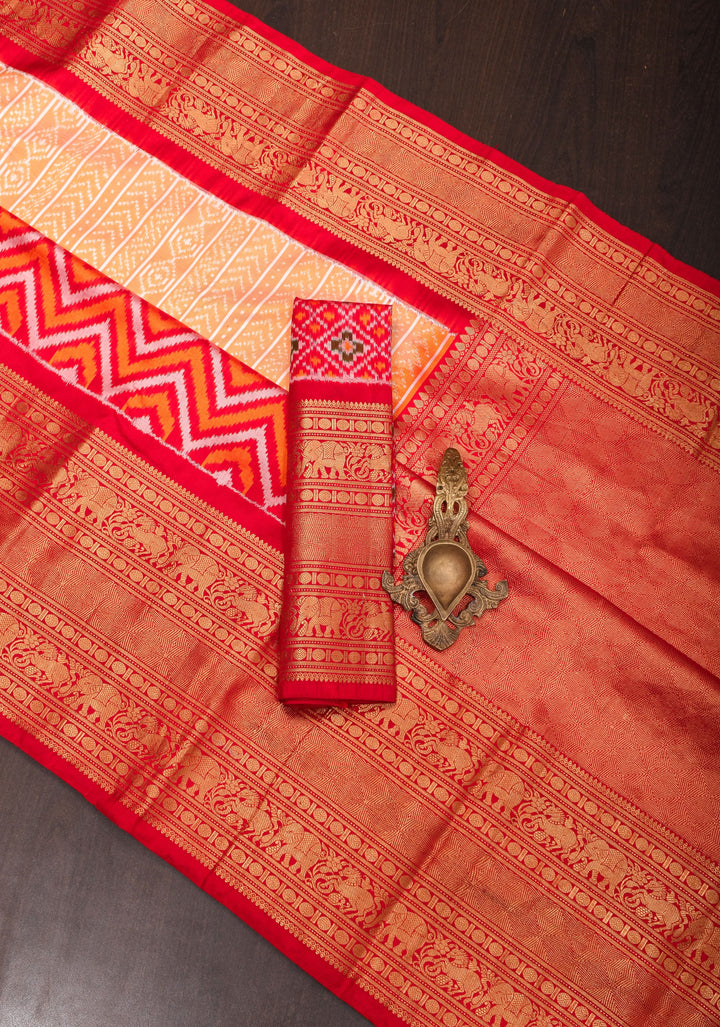 Peach Orange Ikkat Kanjivaram Fusion Pure Silk Saree with Ikkat pattern body and Zari Border| SILK MARK CERTIFIED