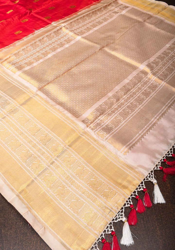 Red Ikkat Kanjivaram Silk Saree with Peacock Motifs and Contrast Wide Zari Border and Ikkat Blouse Piece  | SILK MARK CERTIFIED
