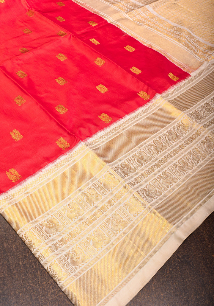 Red Ikkat Kanjivaram Silk Saree with Peacock Motifs and Contrast Wide Zari Border and Ikkat Blouse Piece  | SILK MARK CERTIFIED