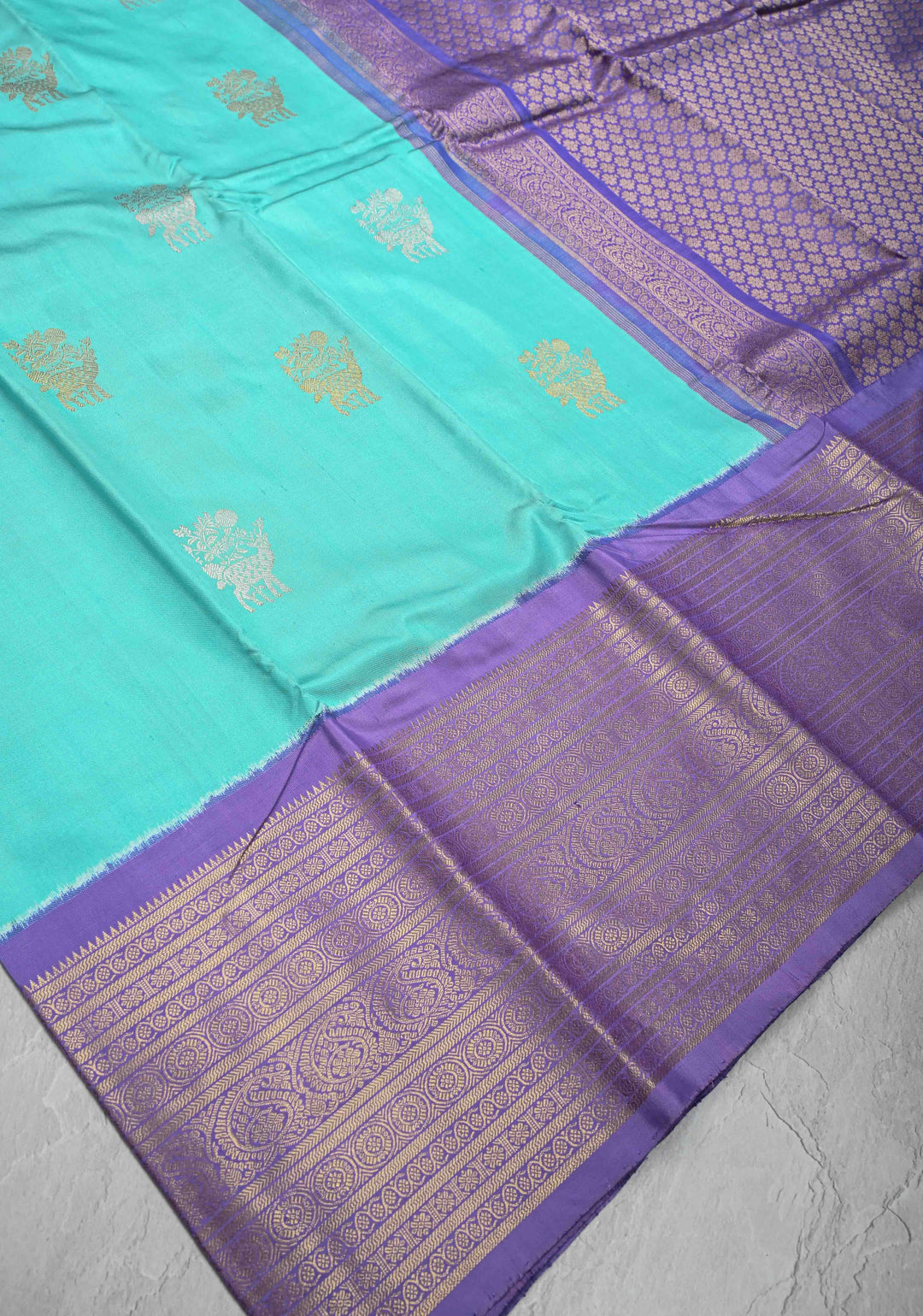 Aqua Blue Ikkat Kanjivaram Fusion Silk Saree with Gold-Silver Buttas and Contrast Zari Border | SILK MARK CERTIFIED