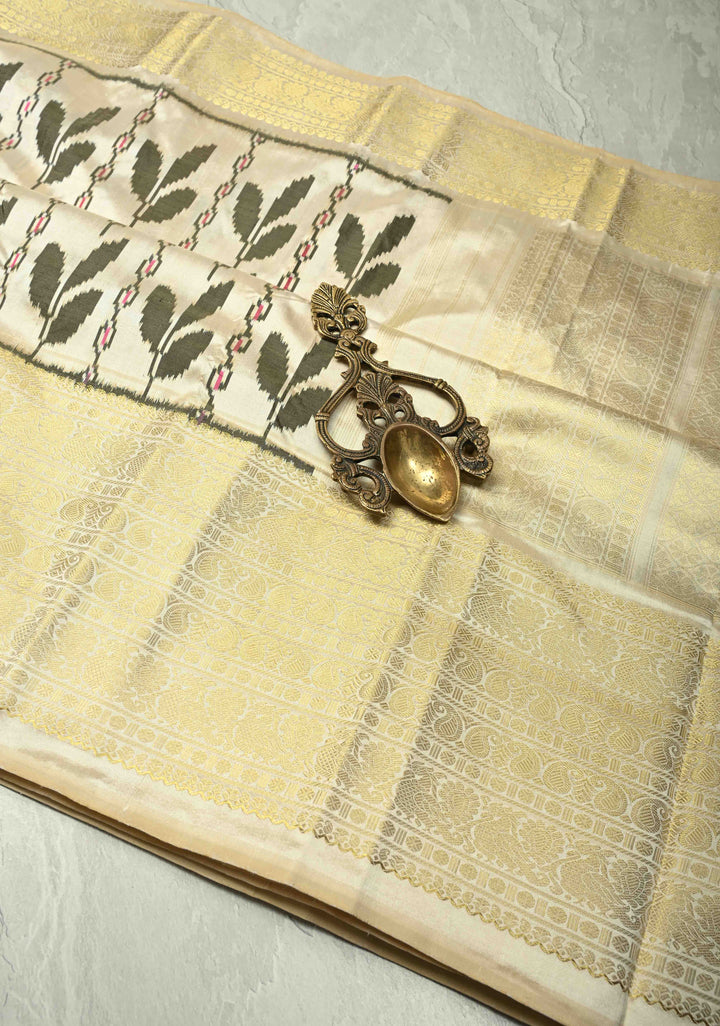 Ivory Pure Ikkat Kanjivaram Fusion Silk Saree with Floral Design and Wide Zari Border | SILK MARK CERTIFIED