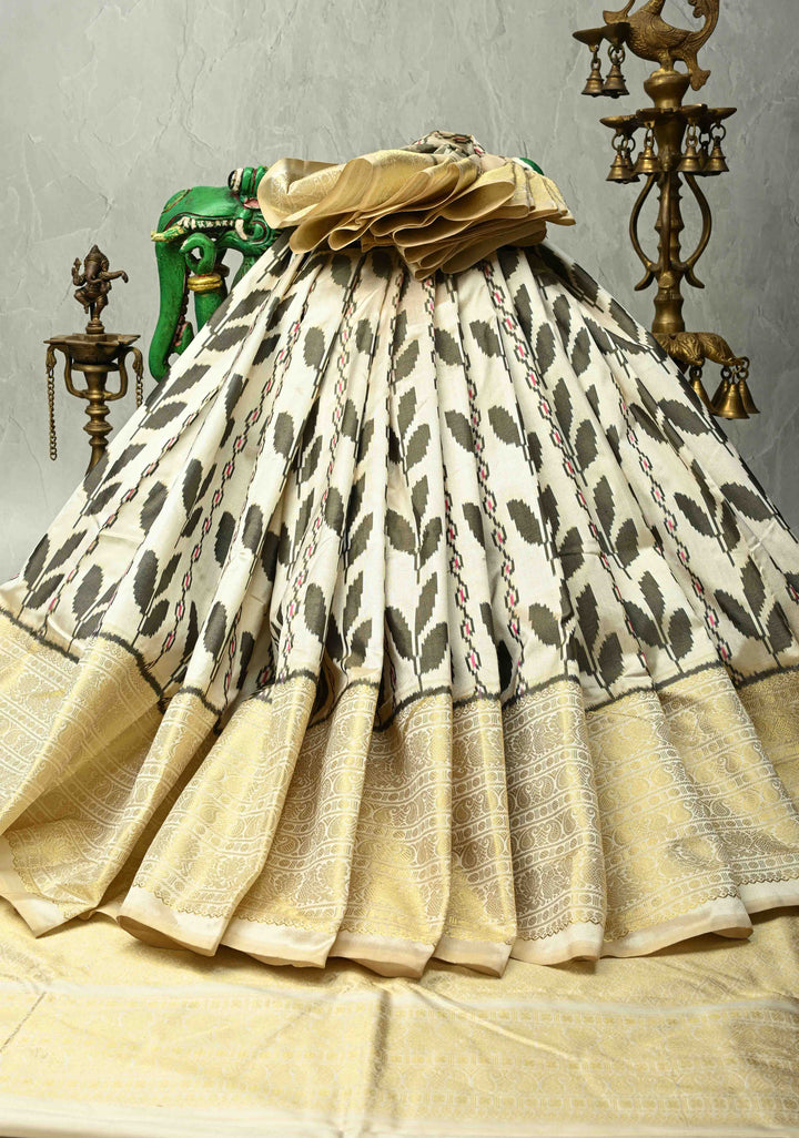 Ivory Pure Ikkat Kanjivaram Fusion Silk Saree with Floral Design and Wide Zari Border | SILK MARK CERTIFIED