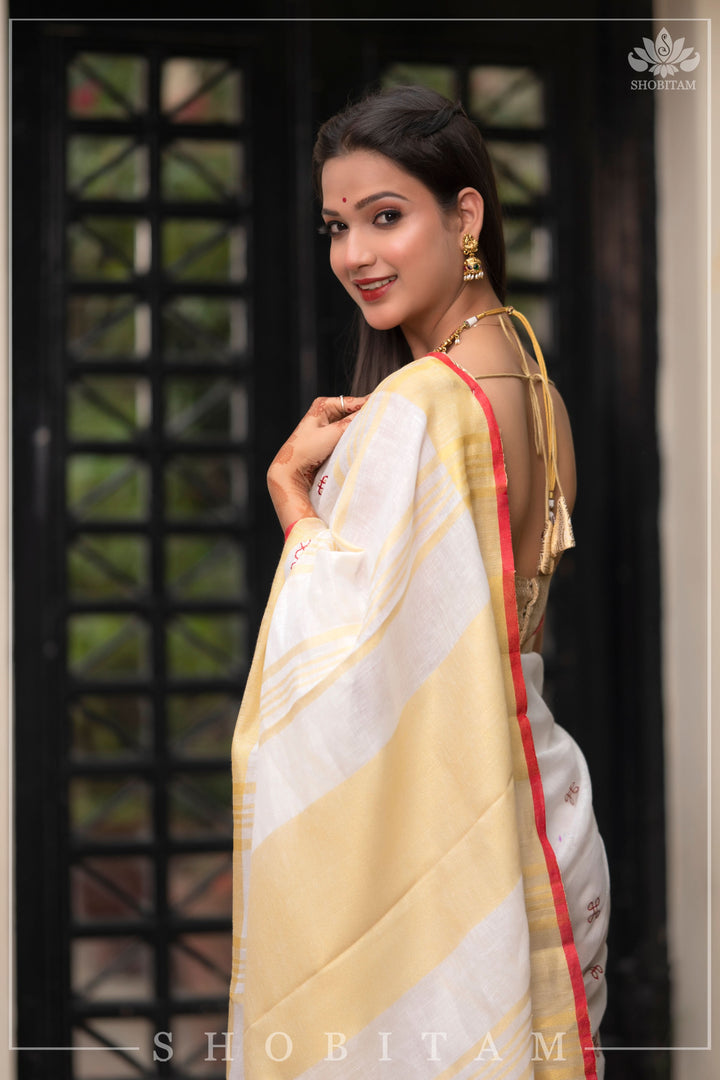 Shobitam Exclusive - Rangoli Embroidered Border on Pure Linen by Linen Saree in White, Red and Gold